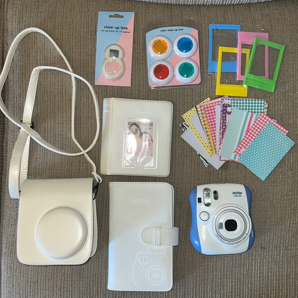 Fuji Film Instax camera with accessories